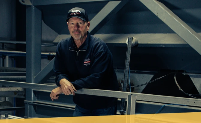 Geiger employee leaving on railing